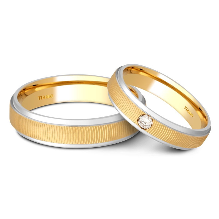 Обручальное кольцо из комбинированного золота с бриллиантом TIAMO (000074)