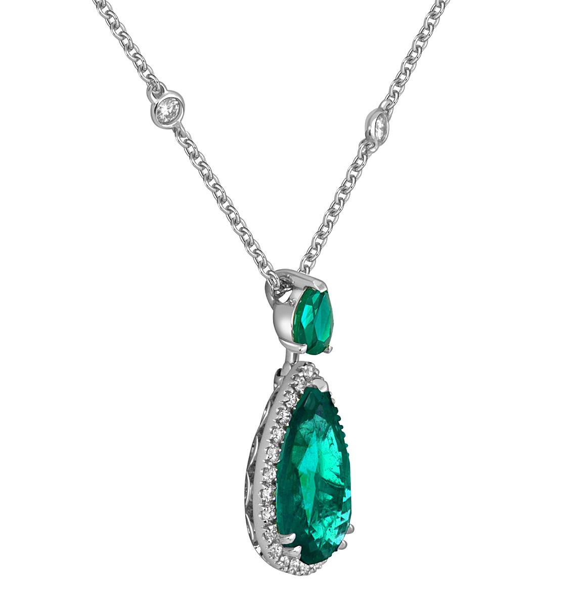 Колье из белого золота с бриллиантами и изумрудами 