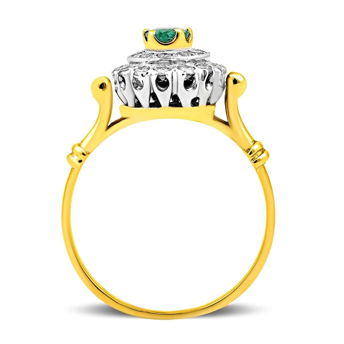 Кольцо из комбинированного золота с бриллиантами и изумрудом (018395)