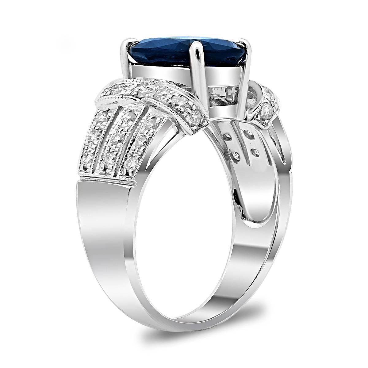 Кольцо из белого золота с бриллиантами и сапфиром (025562)